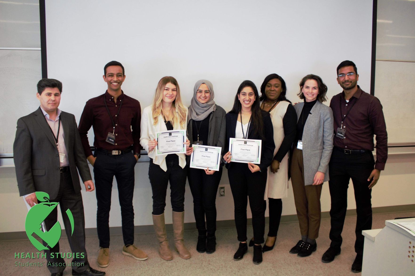 Health winners with judges (Photo)